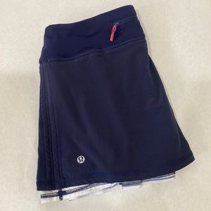 Lululemon Navy tennis skirt with striped underskirt Size 4